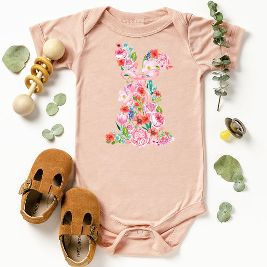 Detail shot of professional print quality on floral bunny Easter bodysuit for infants