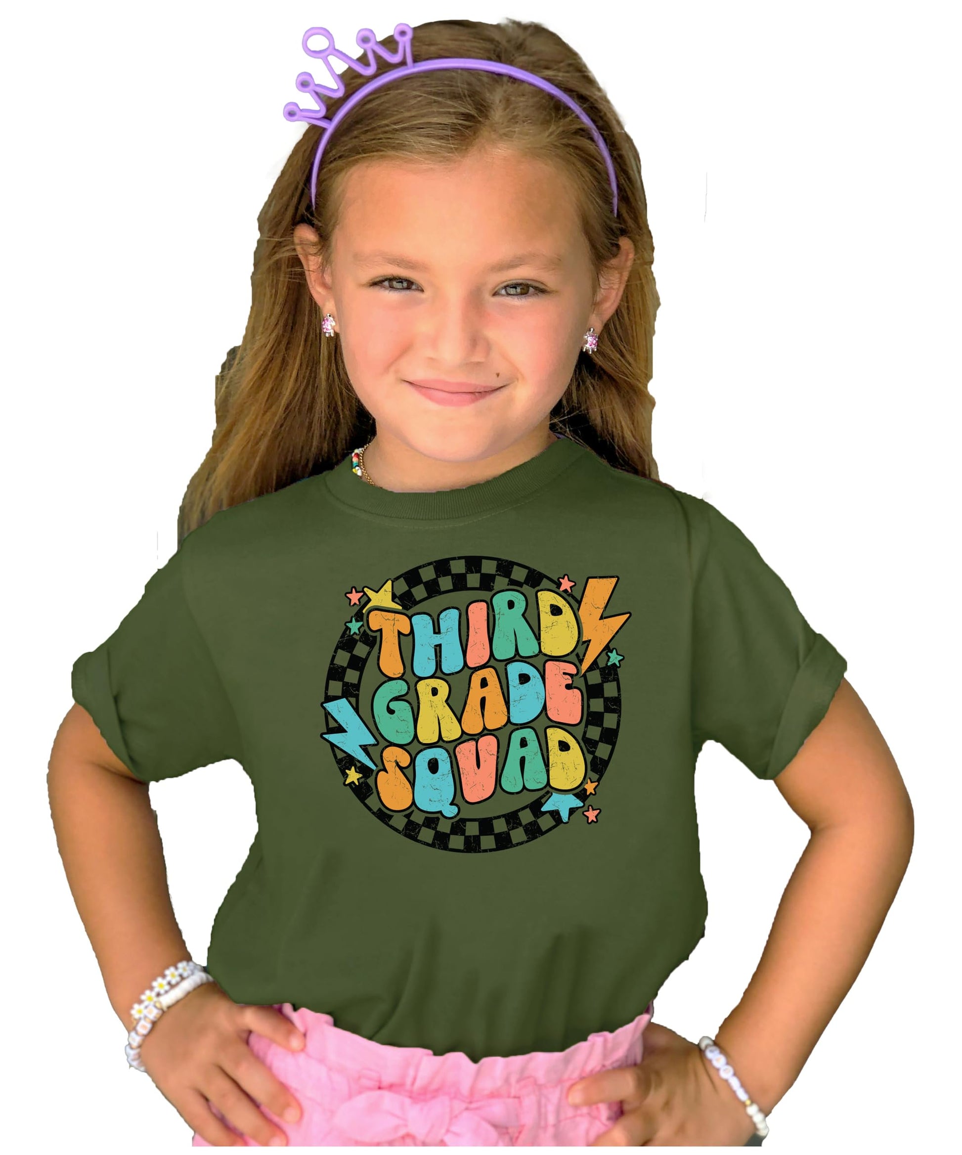 Close-up of retro groovy lightning squad graphic on kids back to school natural shirt