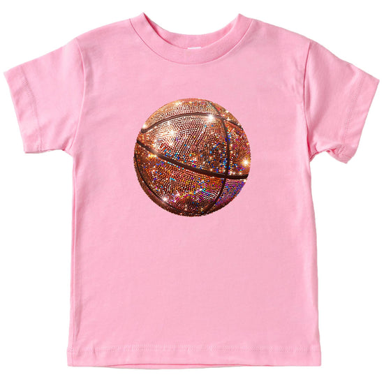 Toddler girl wearing a pink faux glitter basketball graphic tee from Olive Loves Apple