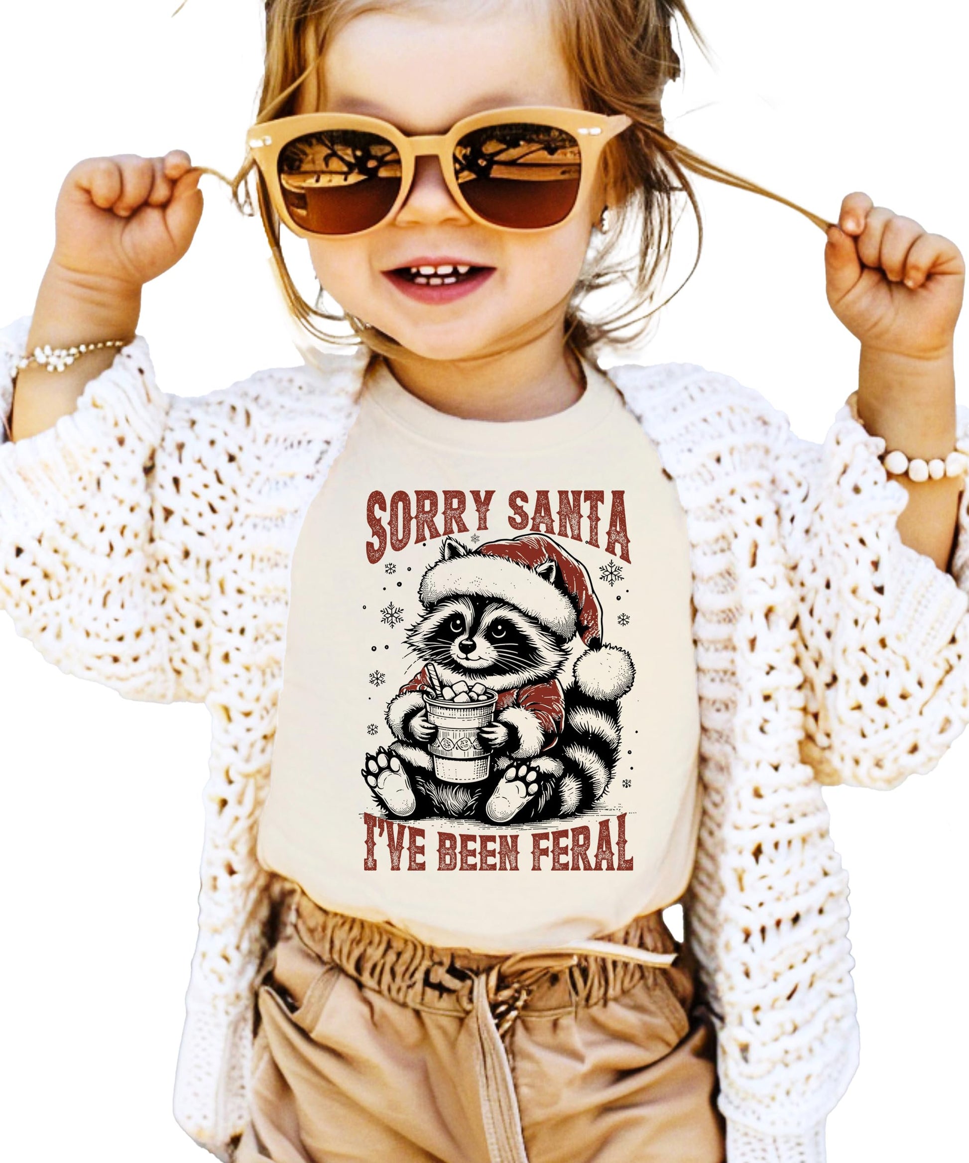 Kids version of Sorry Santa I've Been Feral funny holiday tee with raccoon Santa design