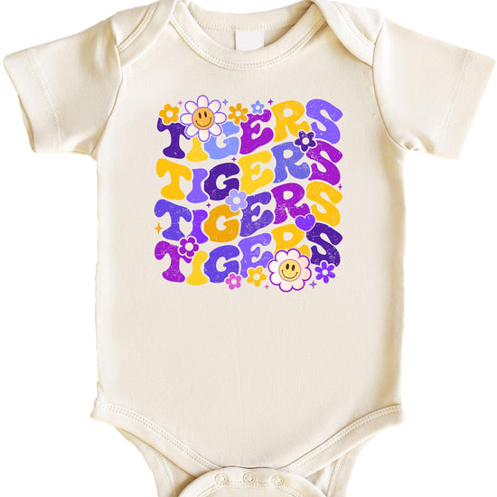 Detail shot of Purple Tigers mascot graphic with vintage-inspired typography and floral elements