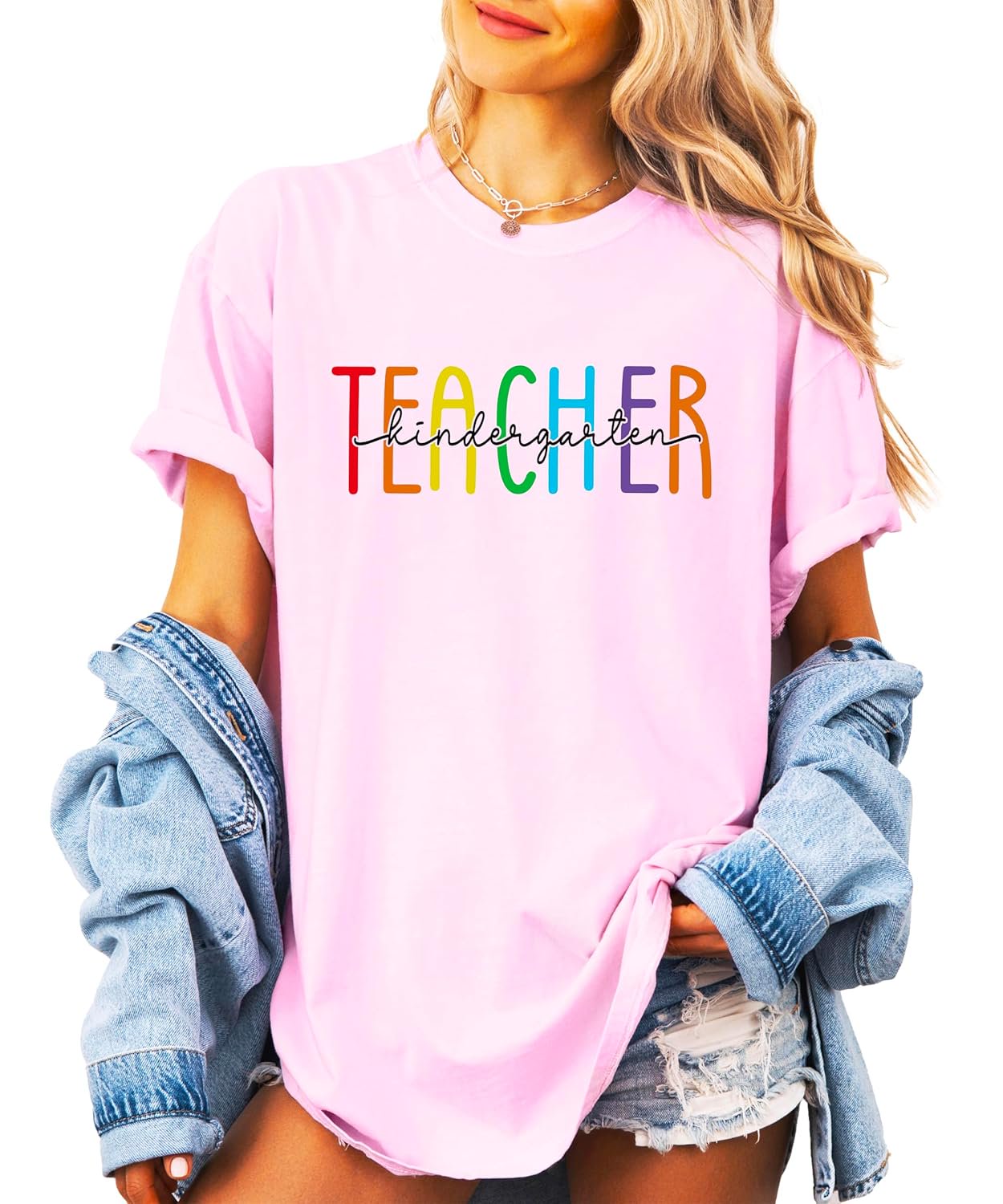 Kindergarten teacher shirt styled with jeans — colorful rainbow graphic tee for women