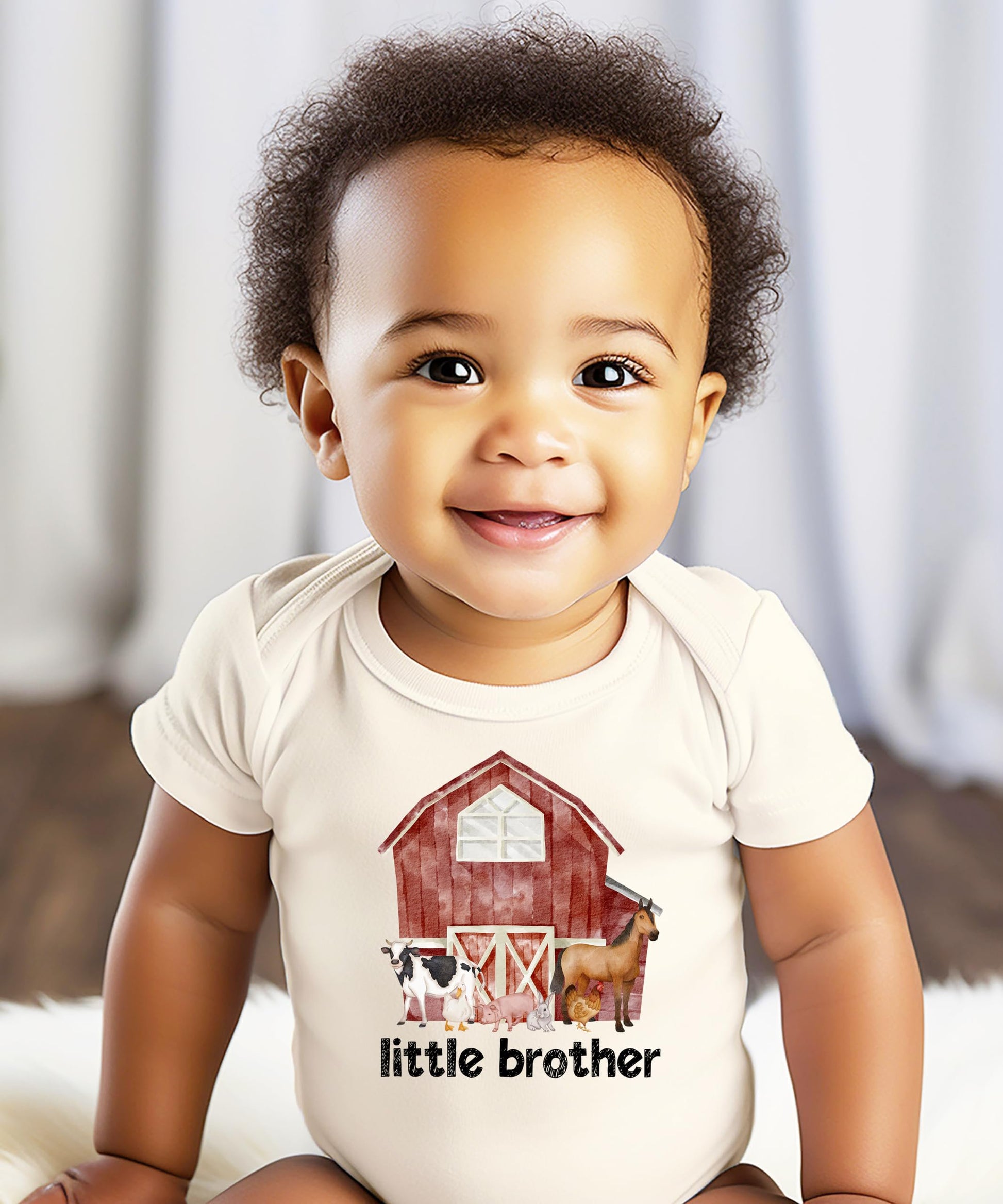 Close-up of farm animals barn graphic print on Little Brother baby bodysuit
