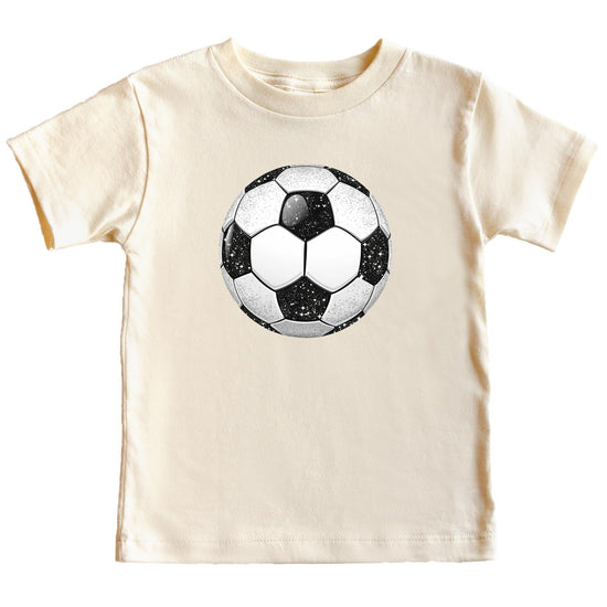 Close-up of faux glitter soccer ball graphic on a black kids tee showing print detail