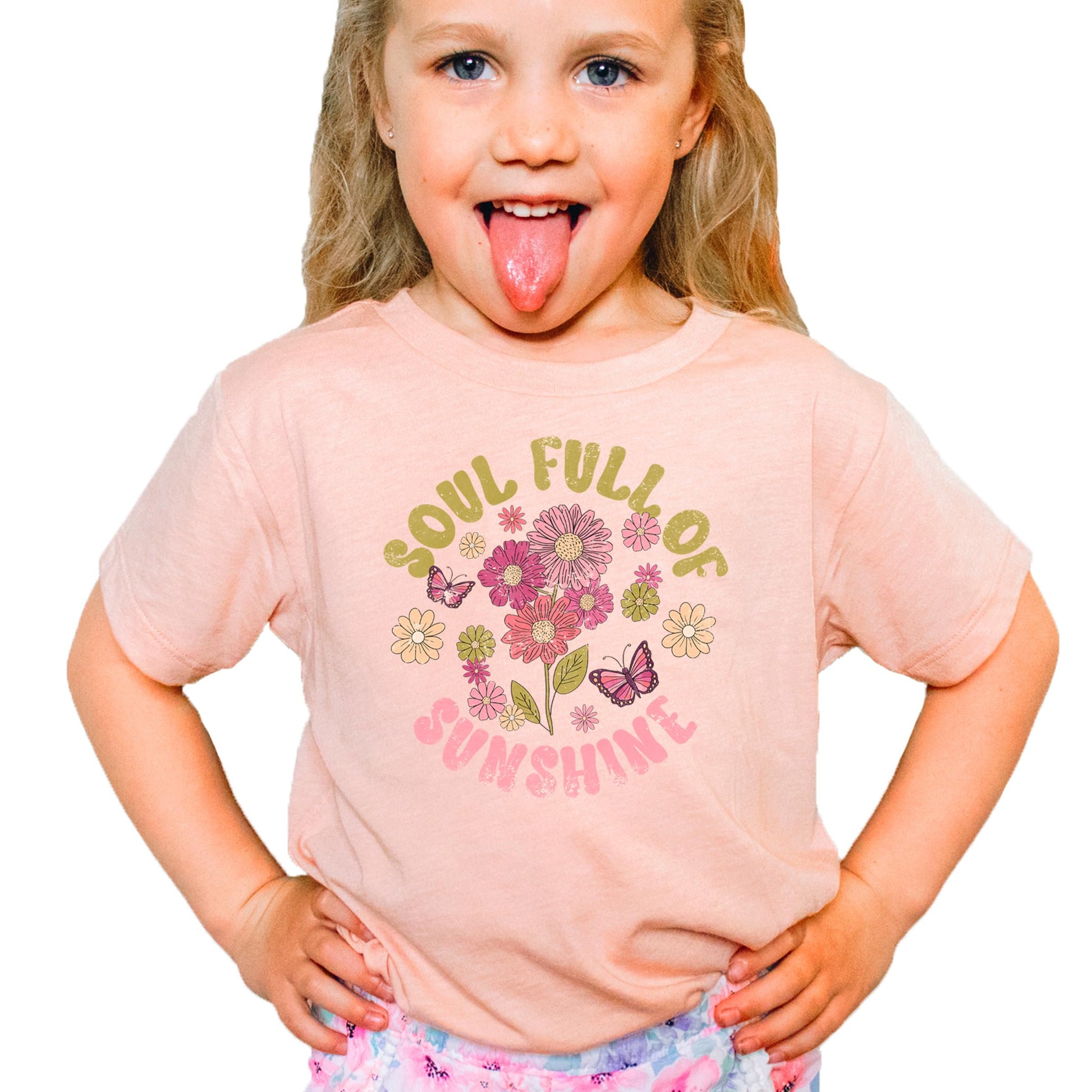 Close-up of vibrant flower and butterfly graphic with pink and yellow Soul Full Of Sunshine text
