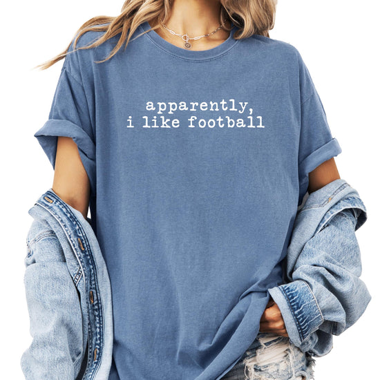 Women's graphic tee with vintage distressed 'Apparently I Like Football' game day print
