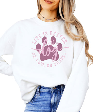 Women's white crewneck sweatshirt with 'Life is Better with a Dog or Two or Three' graphic print