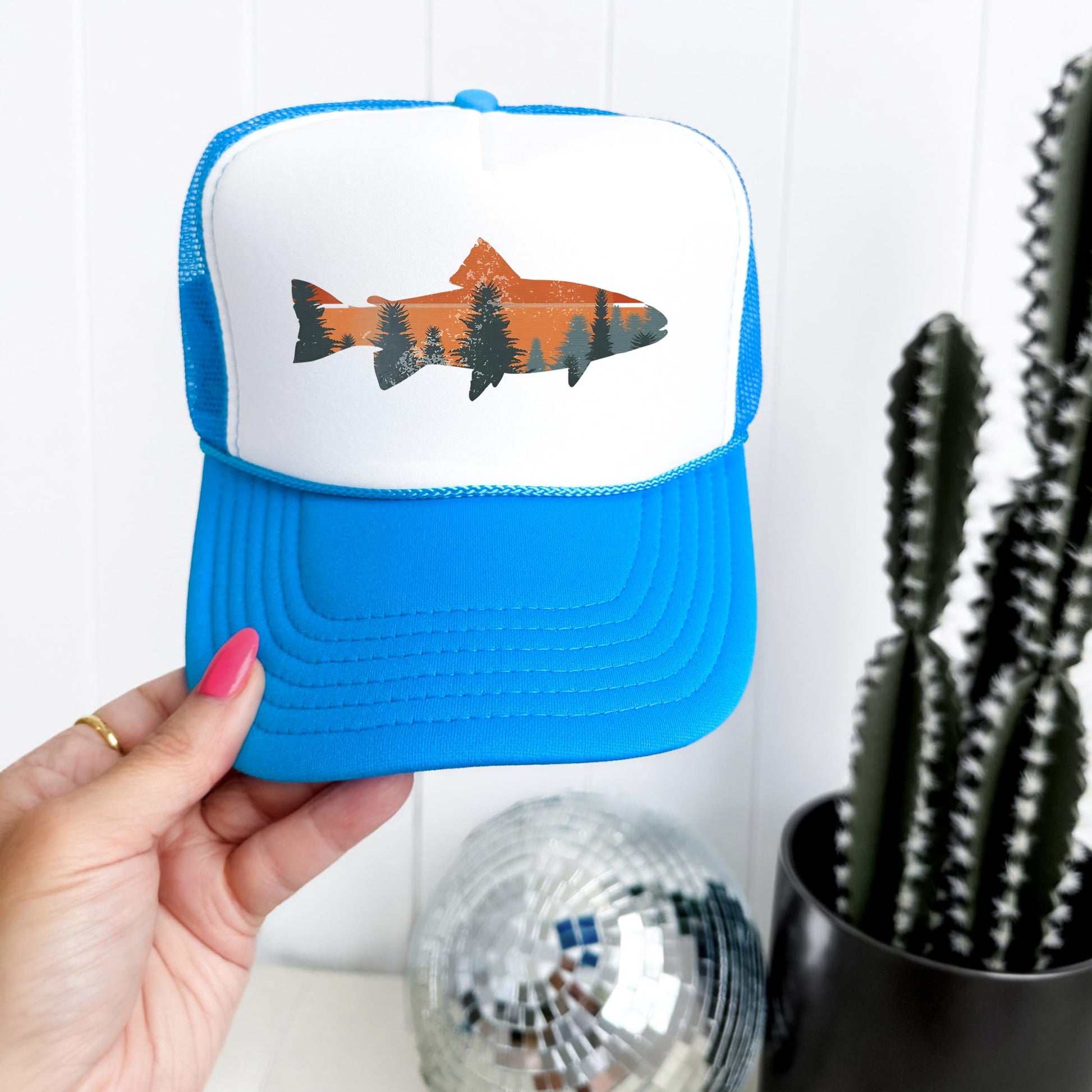Trout fishing sunset trucker hat close up - neon blue foam front snapback