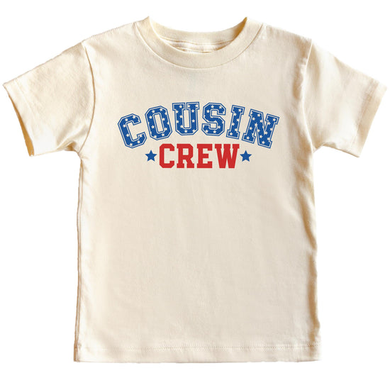 Flat lay of natural kids t-shirt showing full USA Cousin Crew patriotic design