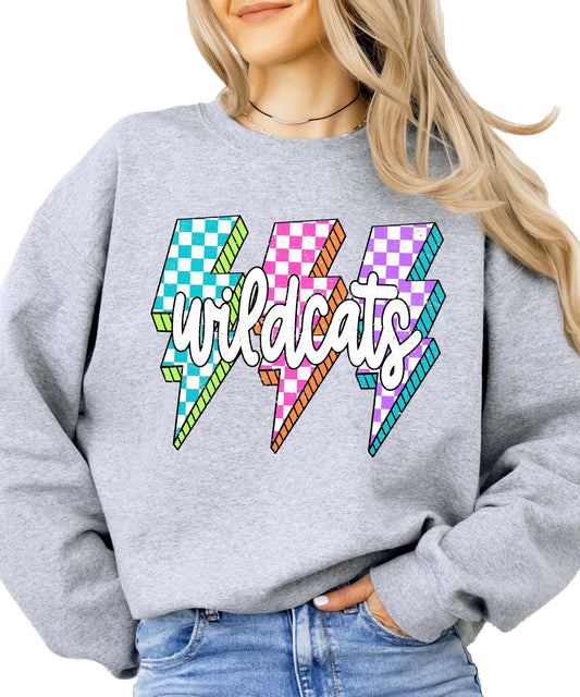 Close-up of lightning bolt graphics in teal, pink, and purple checkered patterns