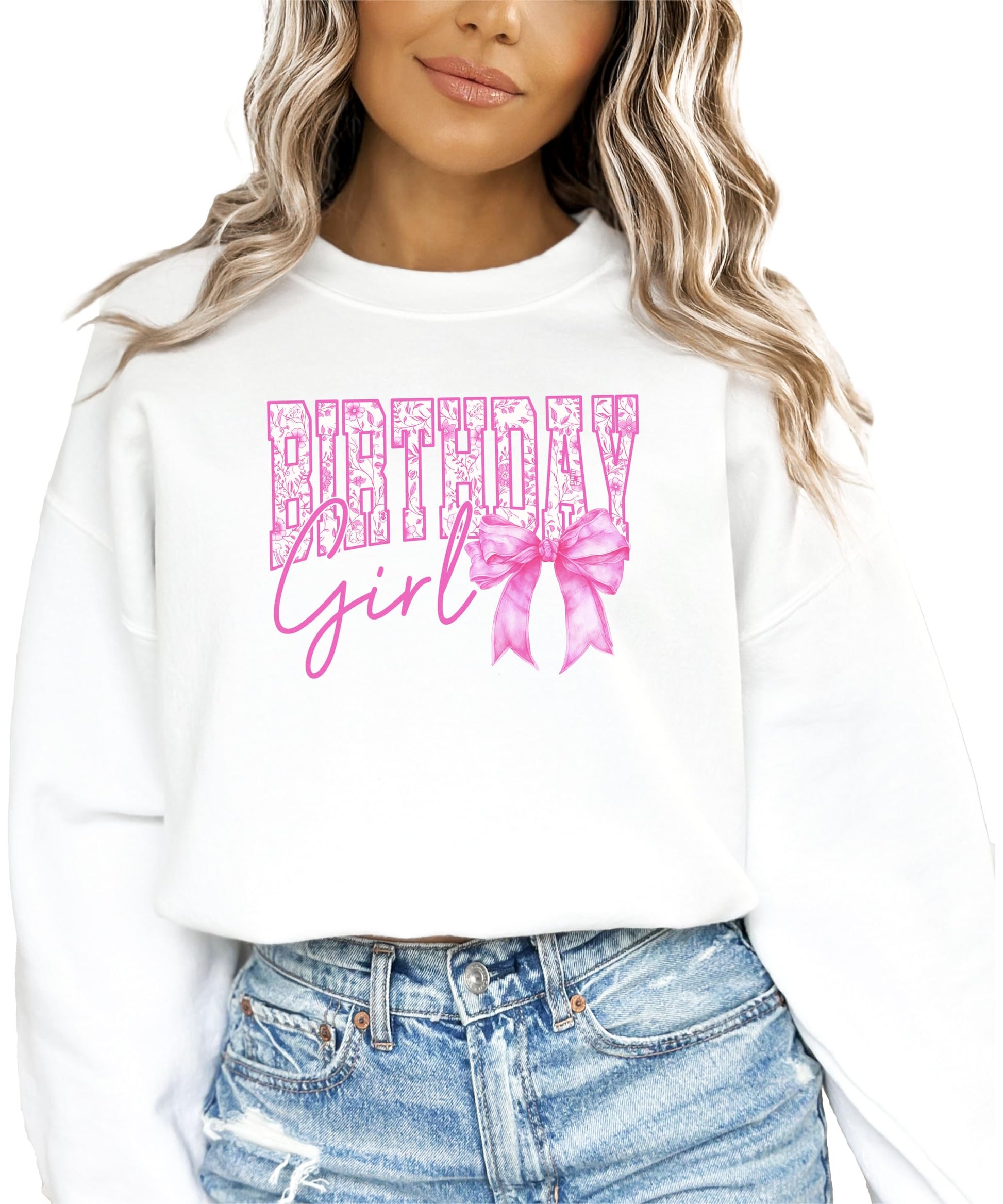 Toddler girl wearing white Birthday Girl bow sweatshirt with pink graphic lettering