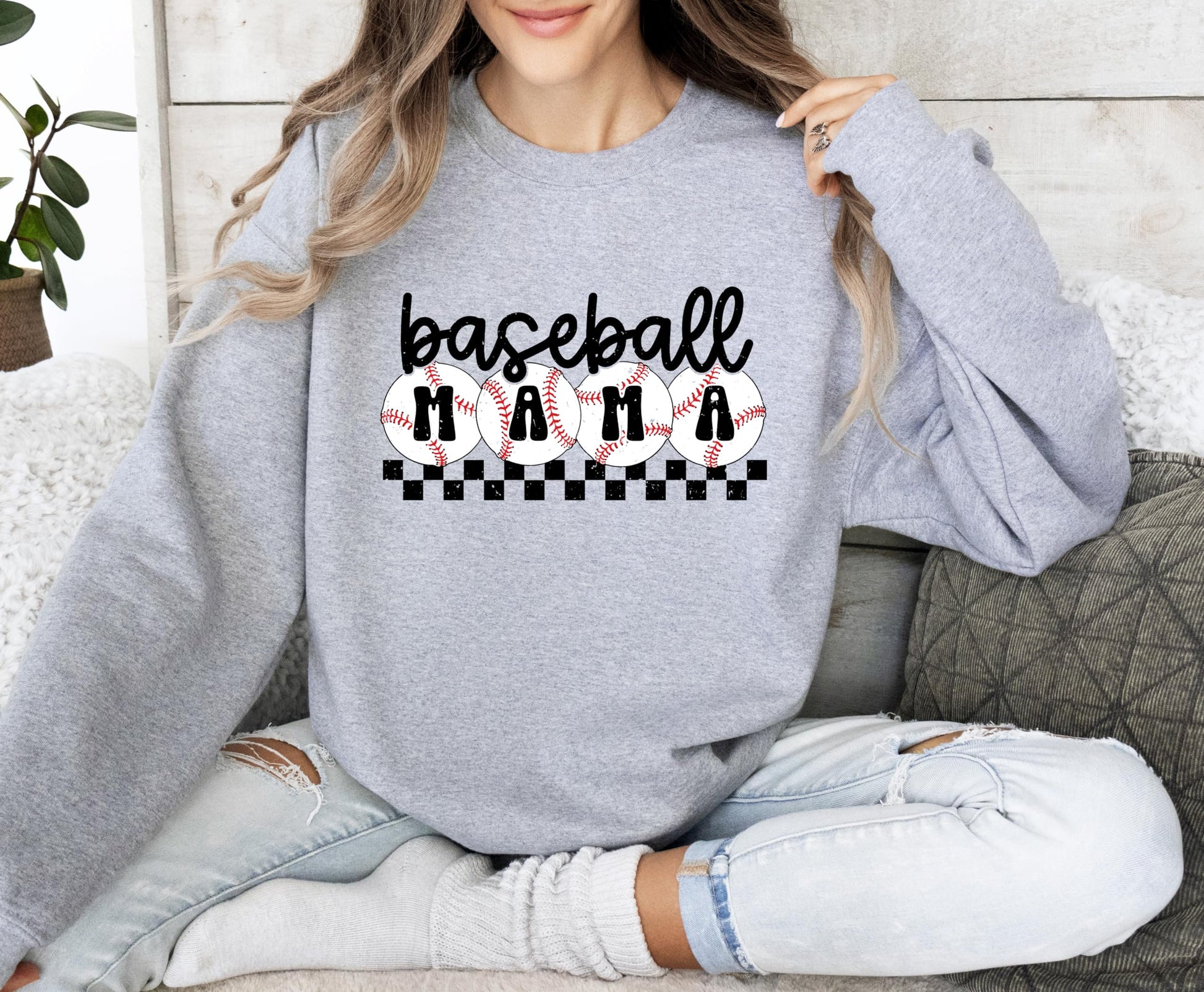 Women modeling checkered baseball mom sweatshirt, casual fit side view