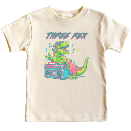 Close-up of Three Rex dinosaur DJ graphic on toddler birthday tee