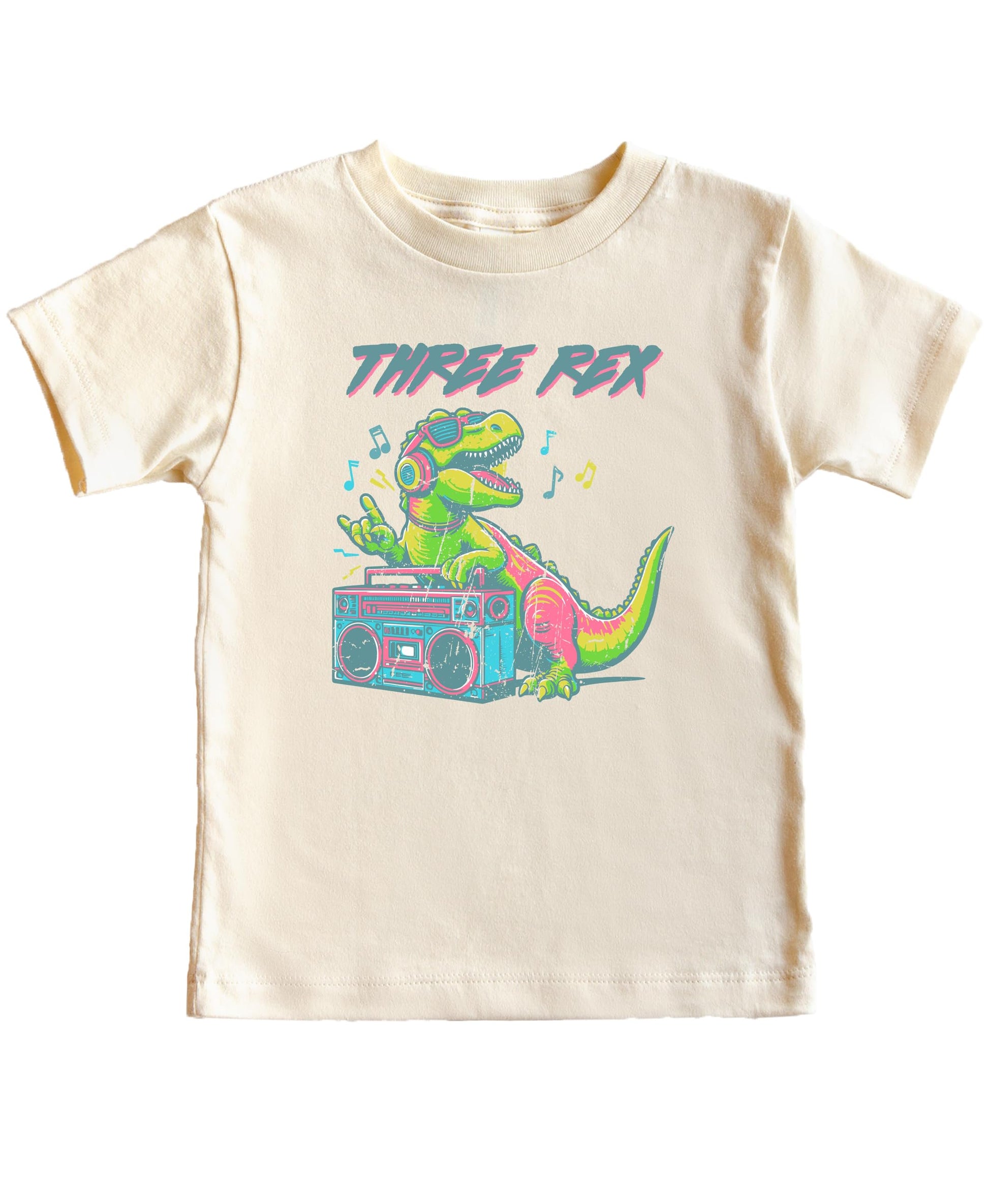 Close-up of Three Rex dinosaur DJ graphic on toddler birthday tee