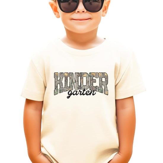 Kids camo Kindergarten tee in pink colorway laid flat showing full graphic design