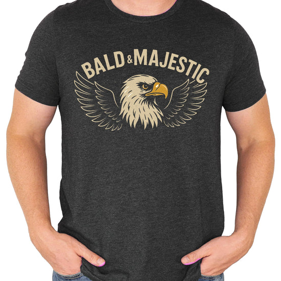 Dark gray heather men's t-shirt with Bald and Majestic bald eagle dad joke graphic printed on the front