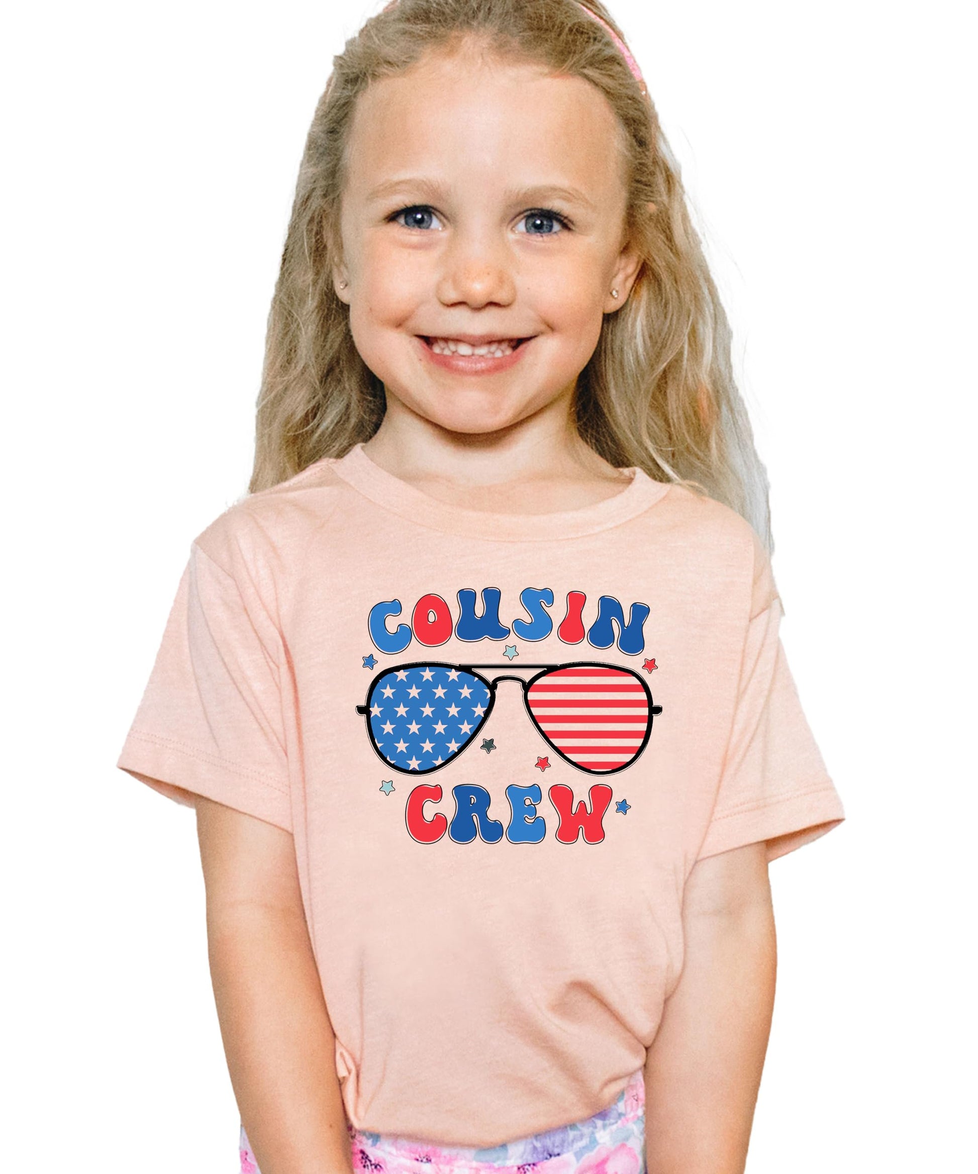 Close-up of patriotic sunglasses graphic with stars and stripes pattern on youth t-shirt