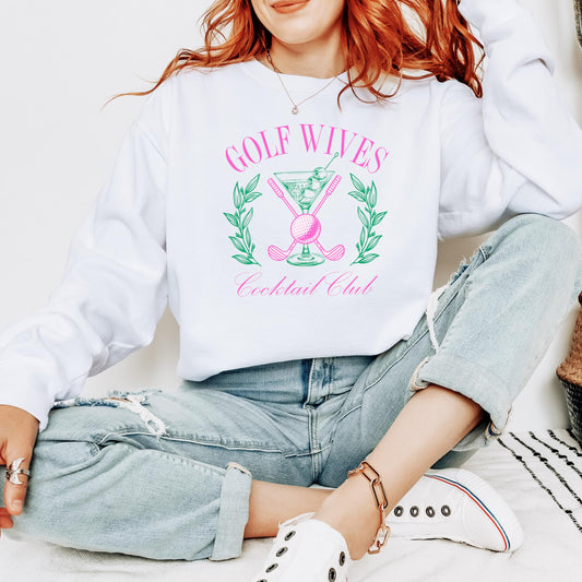 Close-up of Golf Wives Cocktail Club print on a white women's crewneck sweatshirt