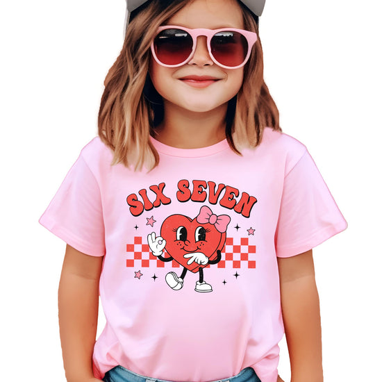 Close-up of bold checkered heart graphic on kids Valentine's Day tee