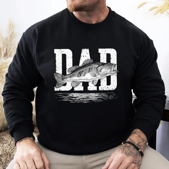 Detail shot of soft fabric and distressed fish graphic on white adult pullover sweatshirt