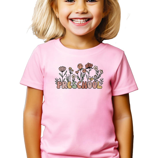Girls wildflower preschool graphic tee with boho floral design and pastel retro lettering