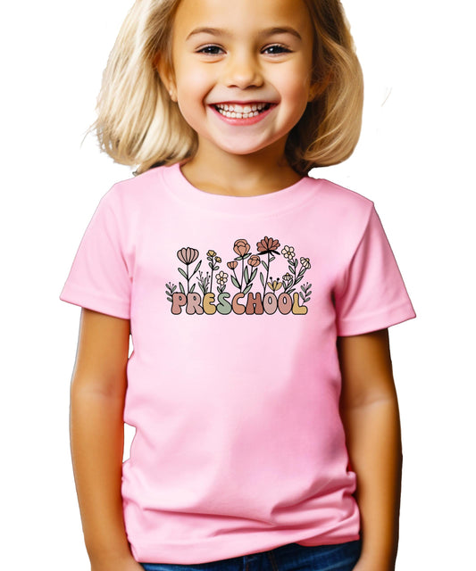 Girls wildflower preschool graphic tee with boho floral design and pastel retro lettering