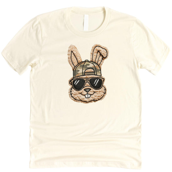 Detail shot of ink printed Easter bunny camo hat design on men's natural graphic tee