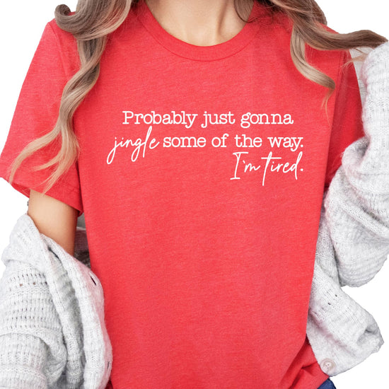 Vintage green funny Christmas t-shirt with 'Probably Just Gonna Jingle Some of the Way, I'm Tired' graphic print