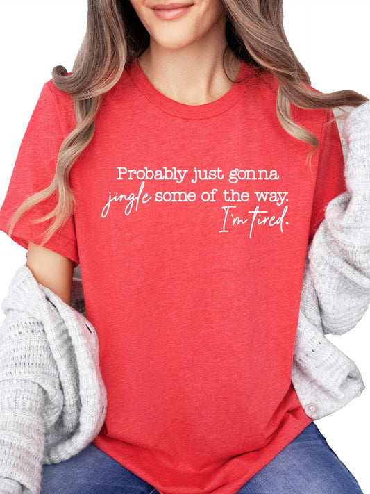 Vintage green funny Christmas t-shirt with 'Probably Just Gonna Jingle Some of the Way, I'm Tired' graphic print
