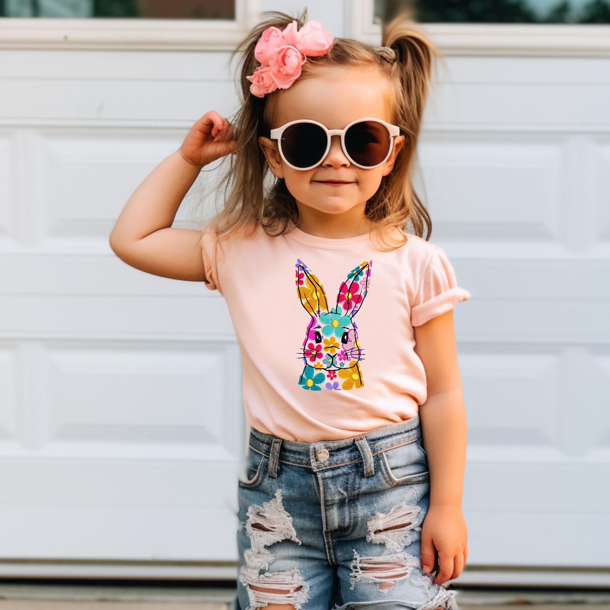 Front view of bright peach floral bunny Easter tee for toddler and youth girls