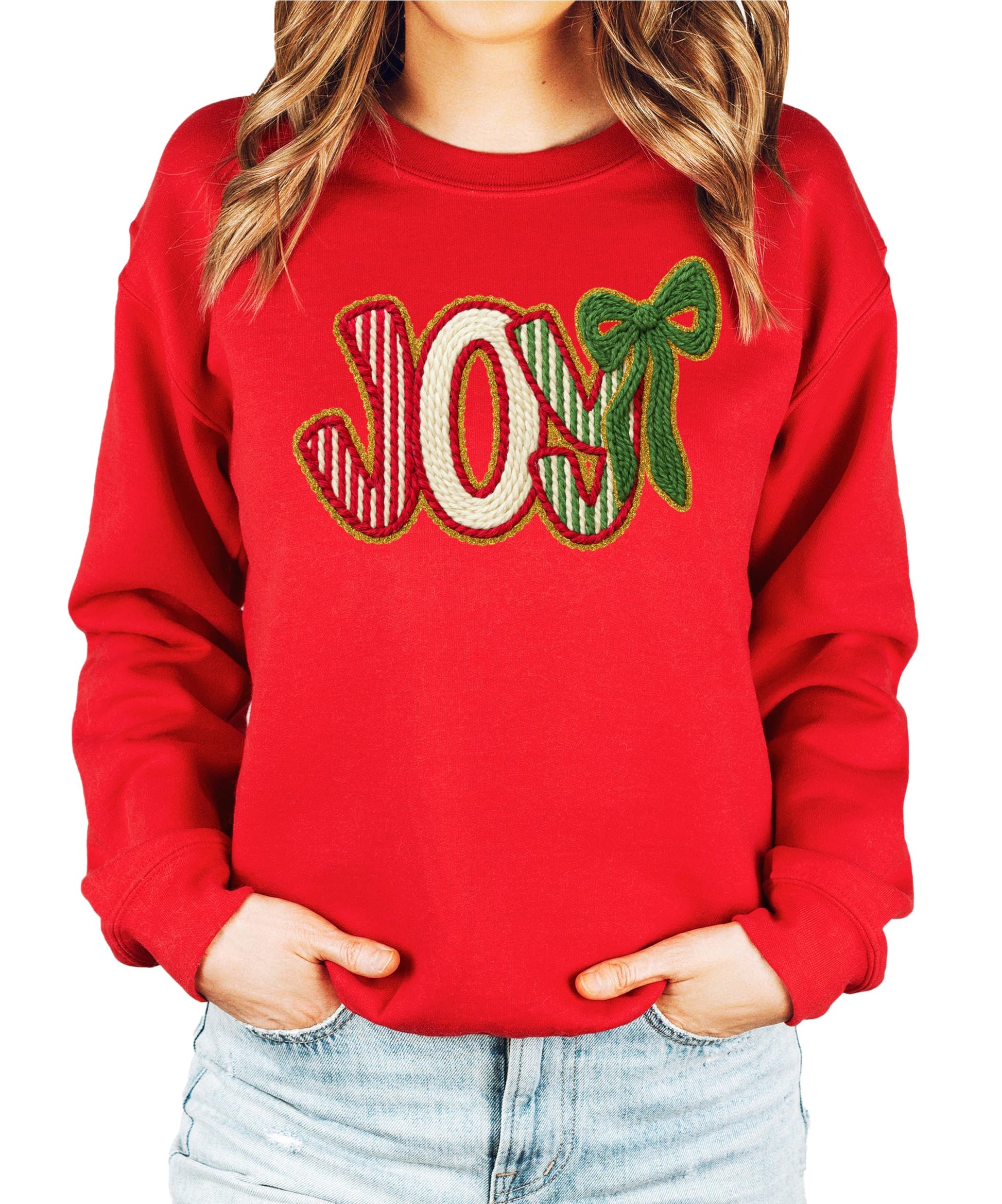 Model wearing cozy JOY Christmas sweatshirt in festive holiday colors
