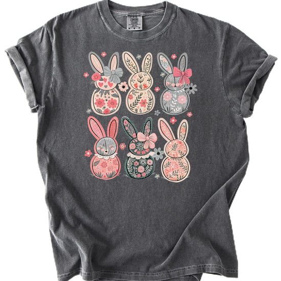 Side view of women's ivory Easter graphic tee featuring six floral bunnies with decorative bows
