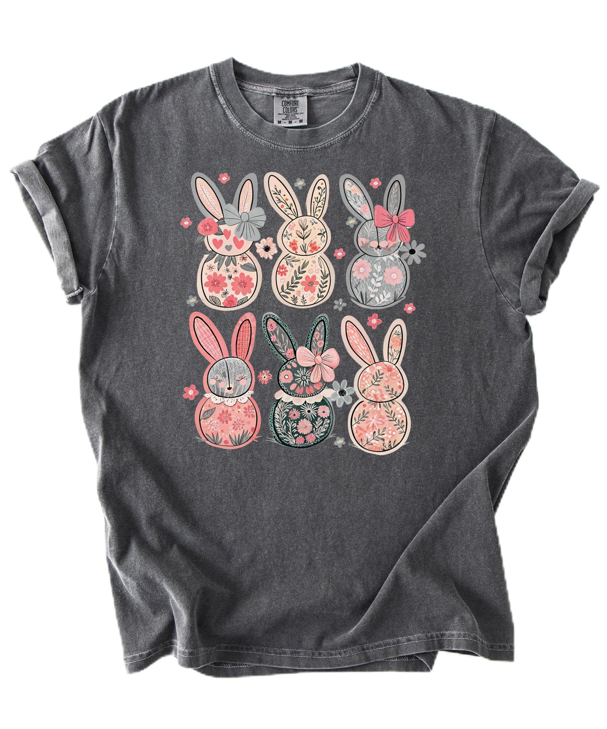 Side view of women's ivory Easter graphic tee featuring six floral bunnies with decorative bows