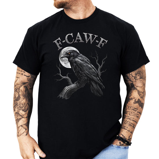 Close-up of funny dark humor crow shirt graphic with moon illustration