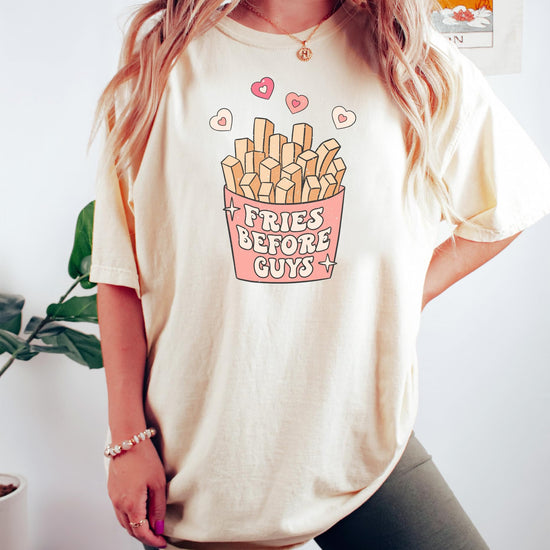 Side view of adult wearing Fries Before Guys funny Galentine's Day shirt