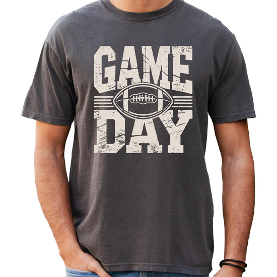 Close-up of Game Day vintage football graphic design on seafoam shirt