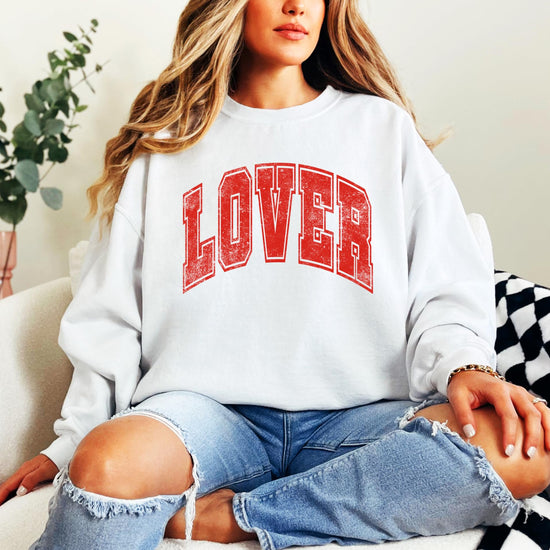 Model wearing red and white Lover varsity sweatshirt for Galentine's Day
