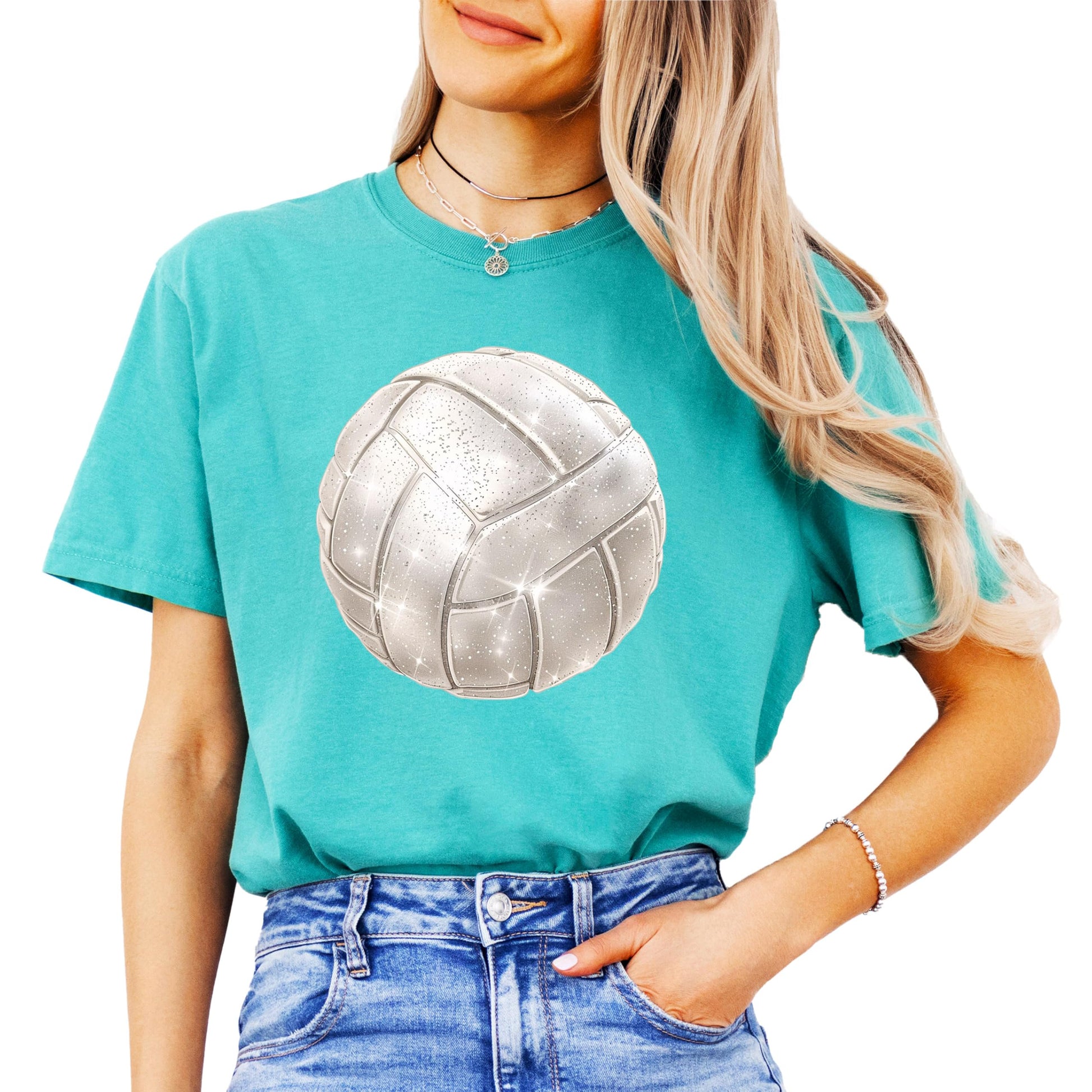 Detail shot of faux glitter volleyball design on women's seafoam graphic shirt