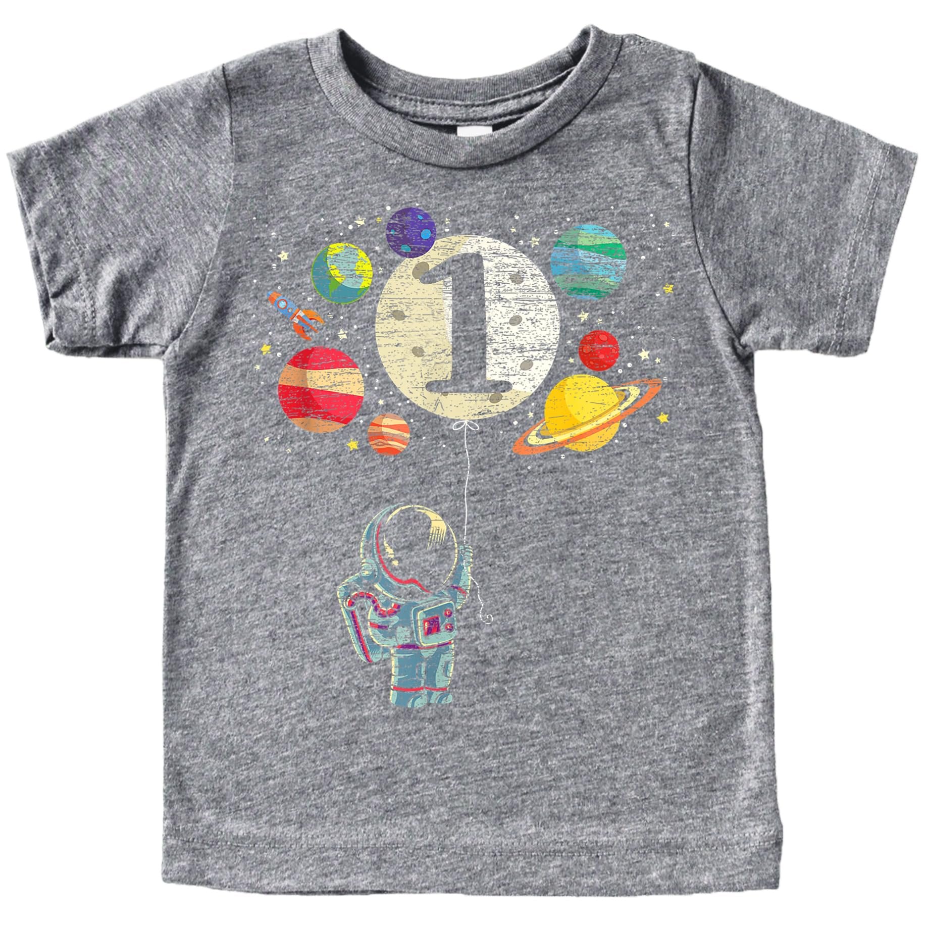 Close-up of space themed first birthday shirt design featuring rocket, moon balloon, and colorful planets