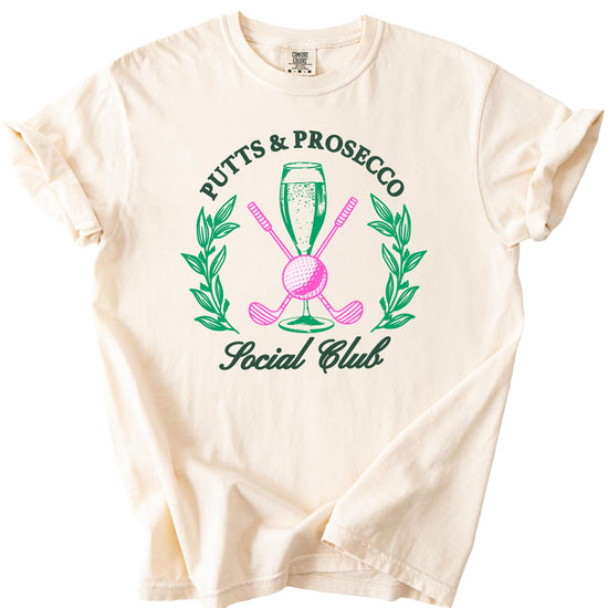 Lifestyle view of women's Putts and Pros Social Club graphic tee, casual golf apparel