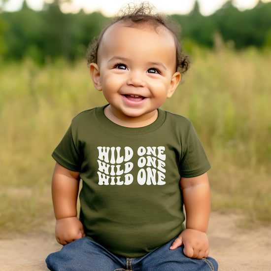 Wild One 1st birthday shirt product shot showing fabric texture and print quality