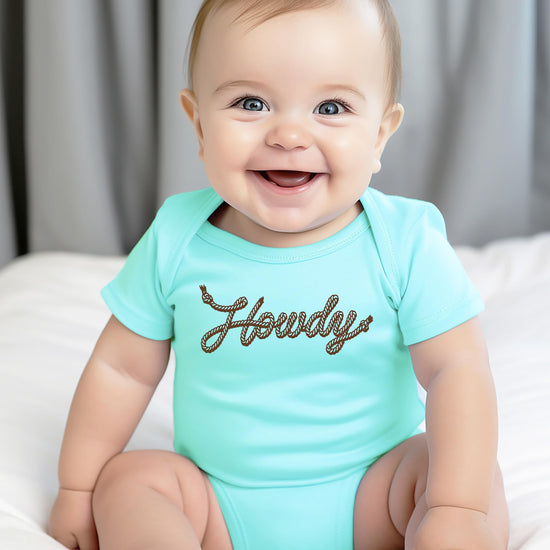 Howdy rope script baby bodysuit displayed on neutral background, gender-neutral country infant outfit