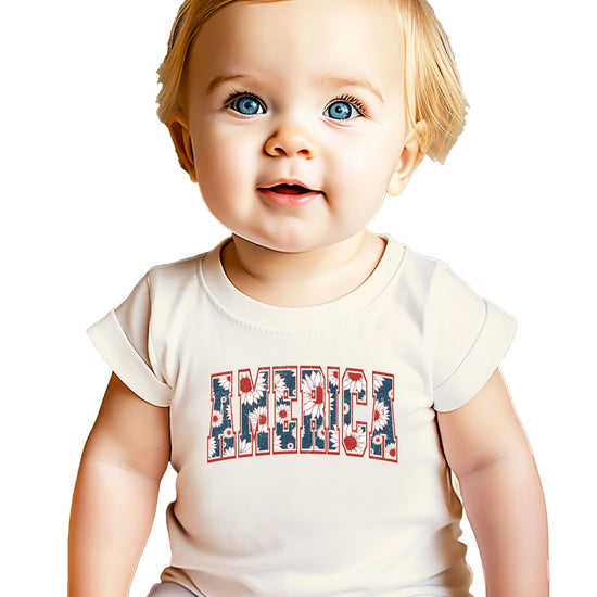 Toddler girl wearing America sunflower patriotic tee perfect for 4th of July