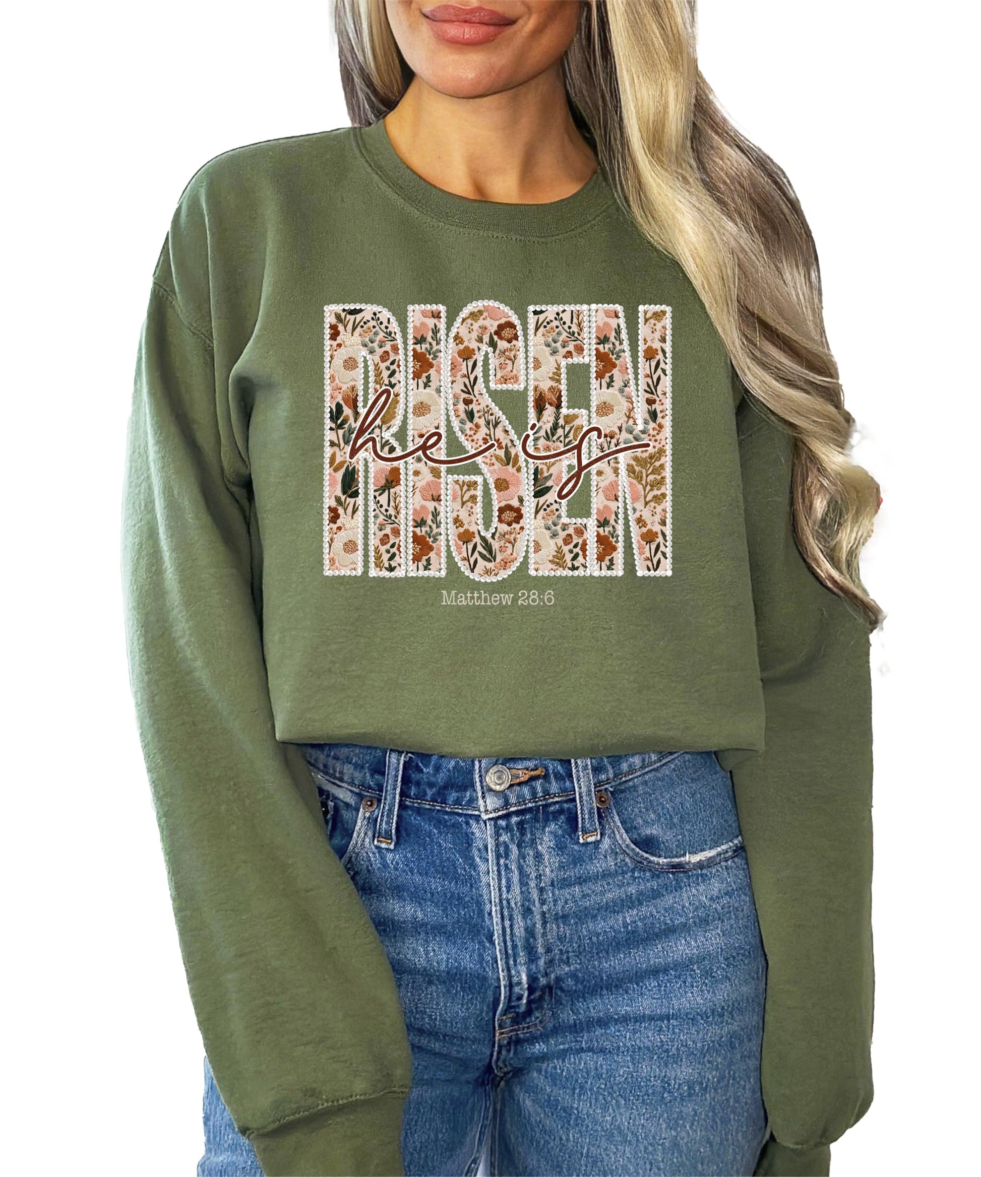 Detail shot of Bible verse Matthew 28:6 graphic on women's Easter faith sweatshirt
