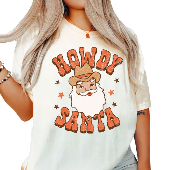 Close-up of Howdy Santa cowboy Santa graphic print on seafoam women's Christmas tee