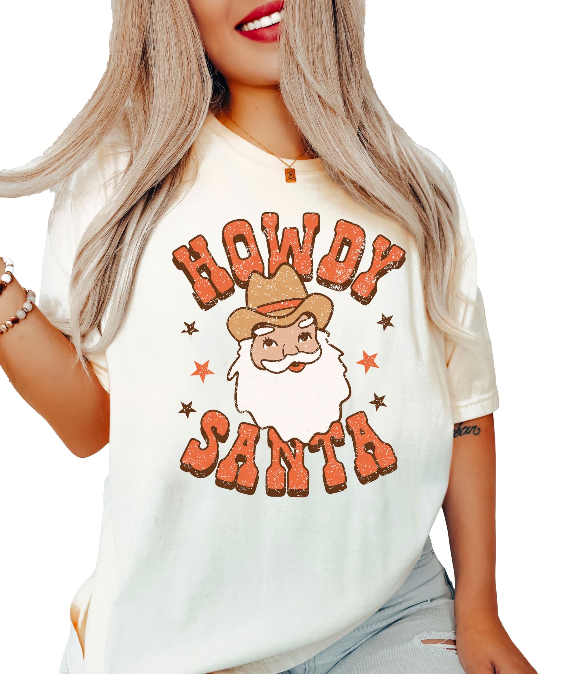 Close-up of Howdy Santa cowboy Santa graphic print on seafoam women's Christmas tee
