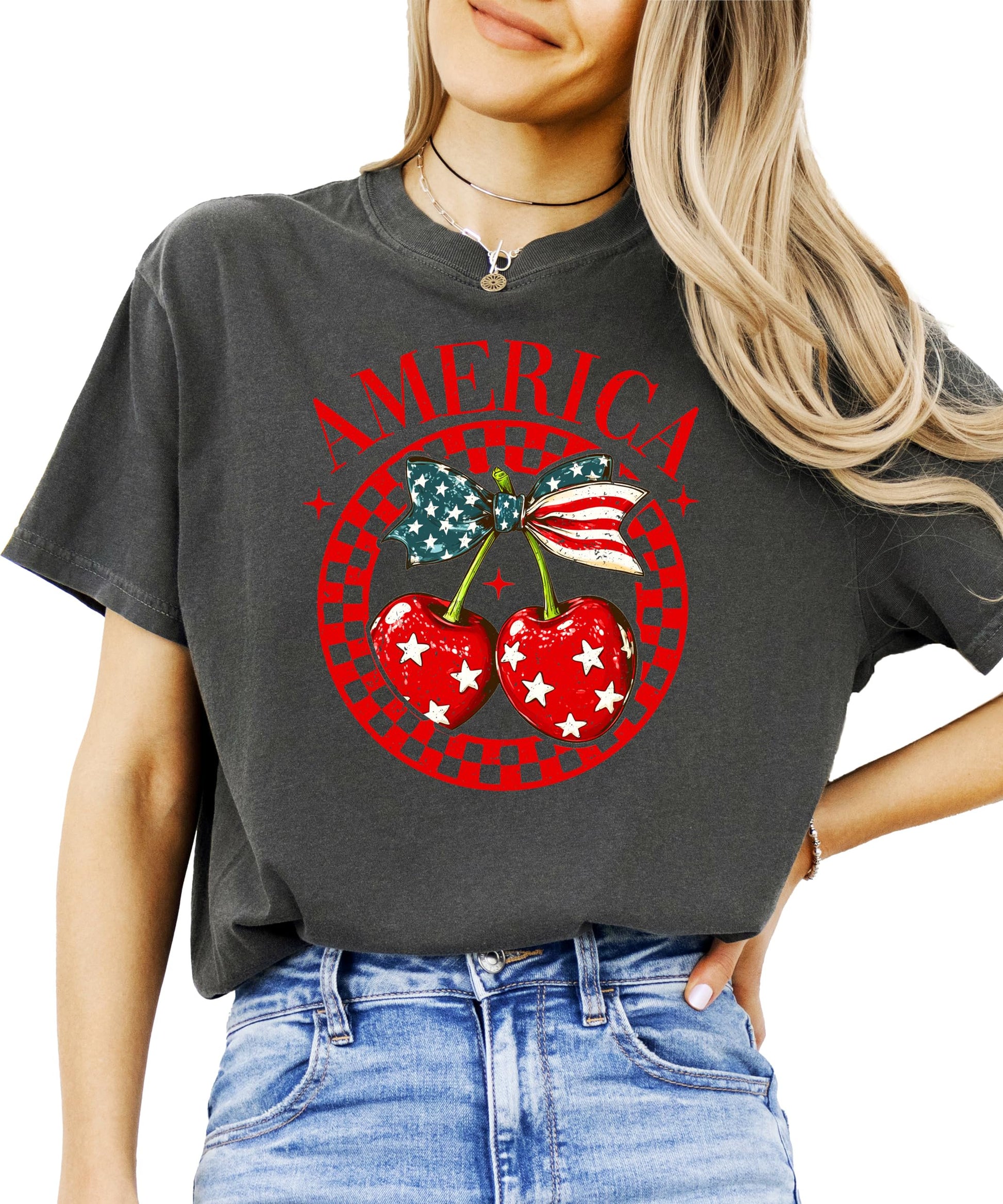 Close-up of red cherry with bow and stars patriotic graphic design