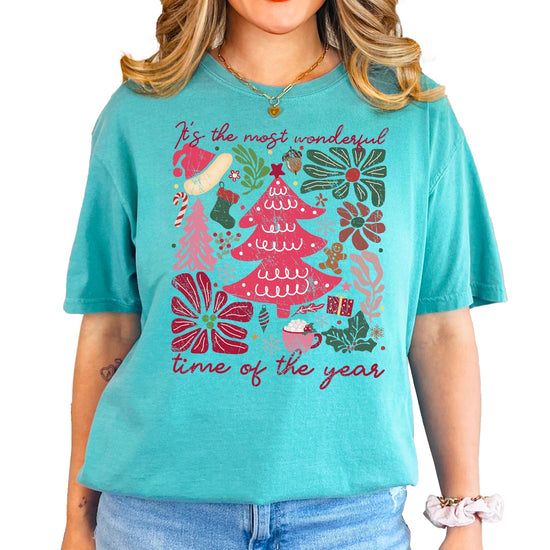 Front view of festive holiday collage Christmas shirt for women and teens in ivory