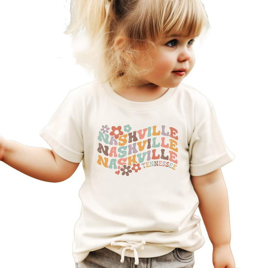 Colorful groovy Nashville Tennessee graphic tee in natural color for women and kids