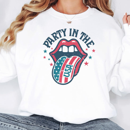 Women's white crewneck sweatshirt featuring retro America Party In The USA graphic, flat lay product view